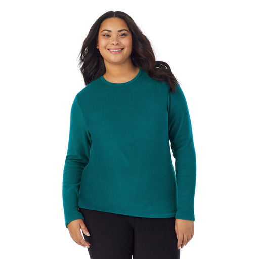 Teal Lagoon;'Model is wearing size 1X. She is 5’11”, Bust 36”, Waist 36.5”, Hips 47.5”.@A lady wearing teal lagoon fleecewear with stretch long sleeve crew plus.