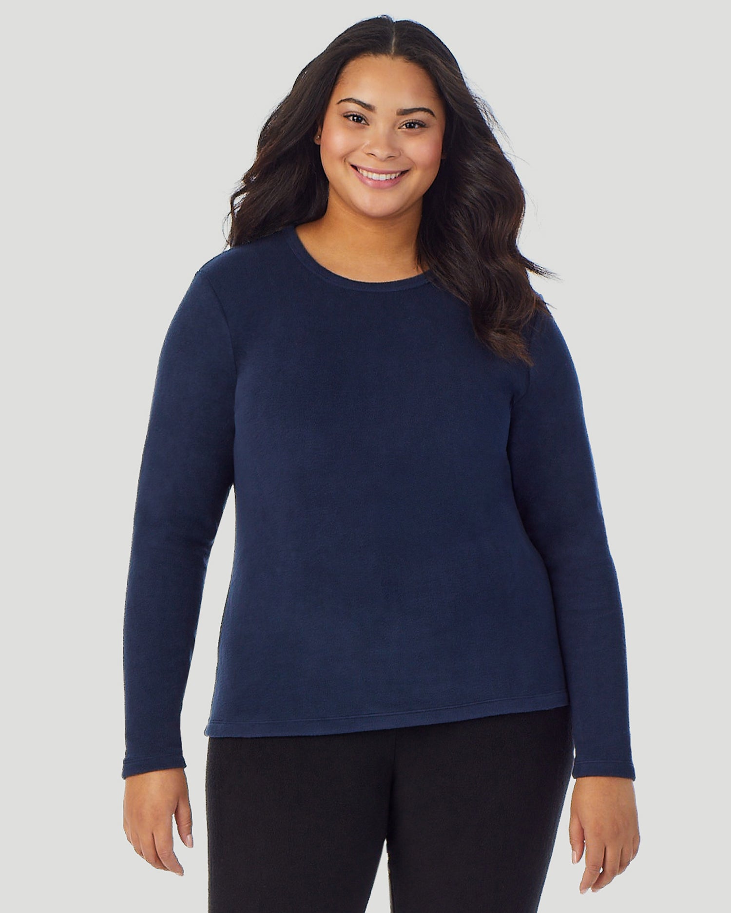 A lady wearing Fleecewear With Stretch Long Sleeve Crew PLUS in Navy Blazer side view side view