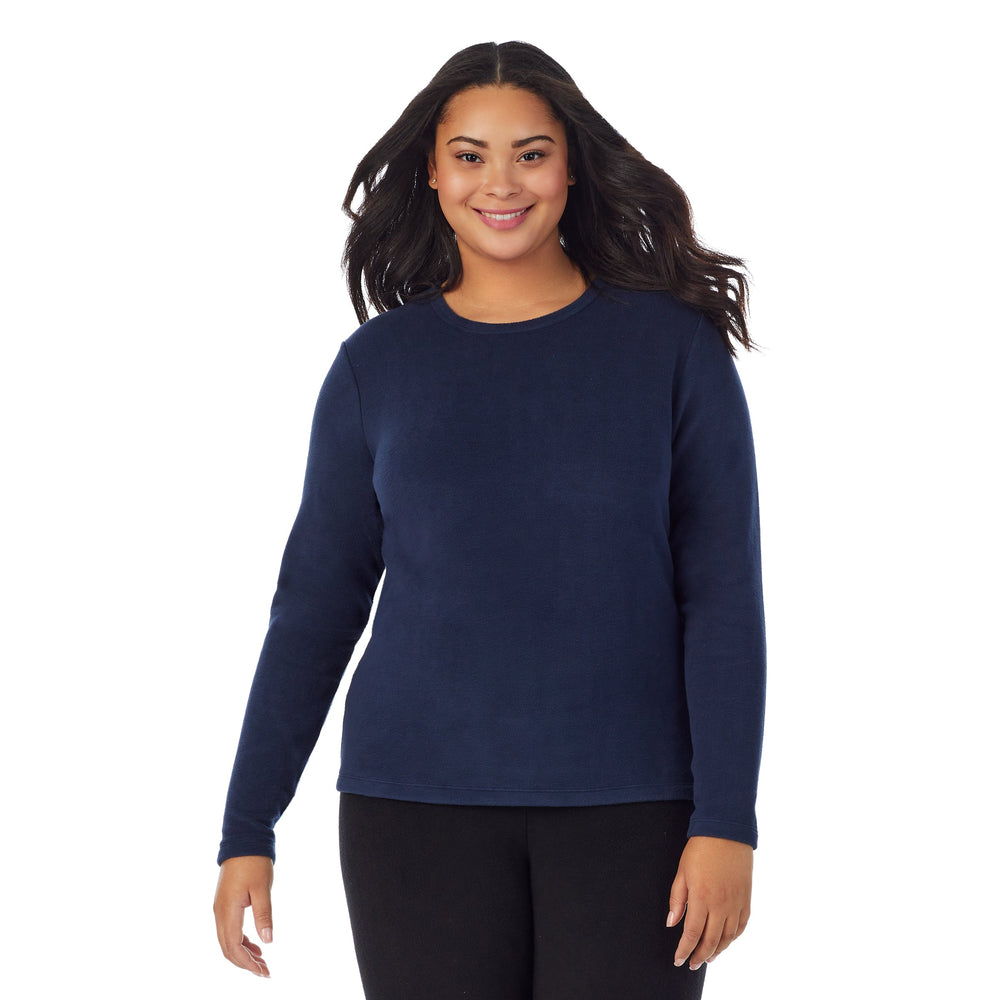 A lady wearing Fleecewear With Stretch Long Sleeve Crew PLUS in Navy Blazer back view back view