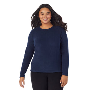 A lady wearing Fleecewear With Stretch Long Sleeve Crew PLUS in Navy Blazer back view back view