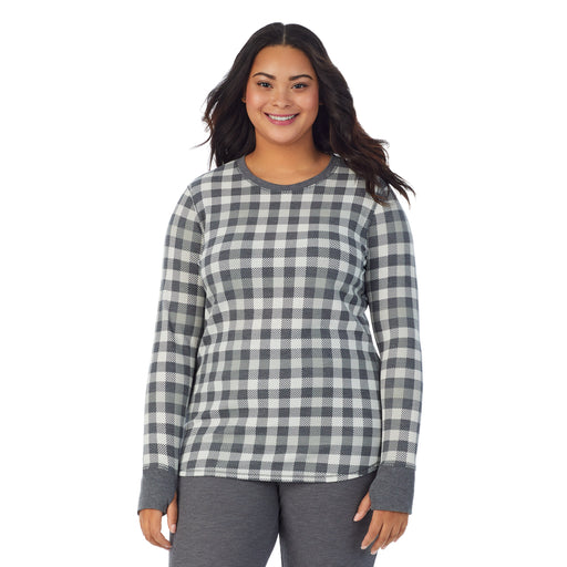 Grey Buffalo; Model is wearing size 1X. She is 5’11”, Bust 36”, Waist 36.5”, Hips 47.5”. @A lady wearing a  Grey Buffalo long sleeve crew plus.