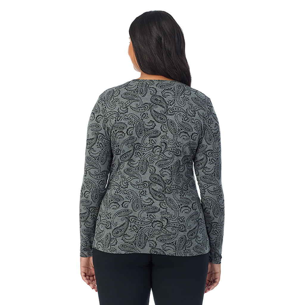 A lady wearing a charcoal heather paisley long sleeve crew plus.