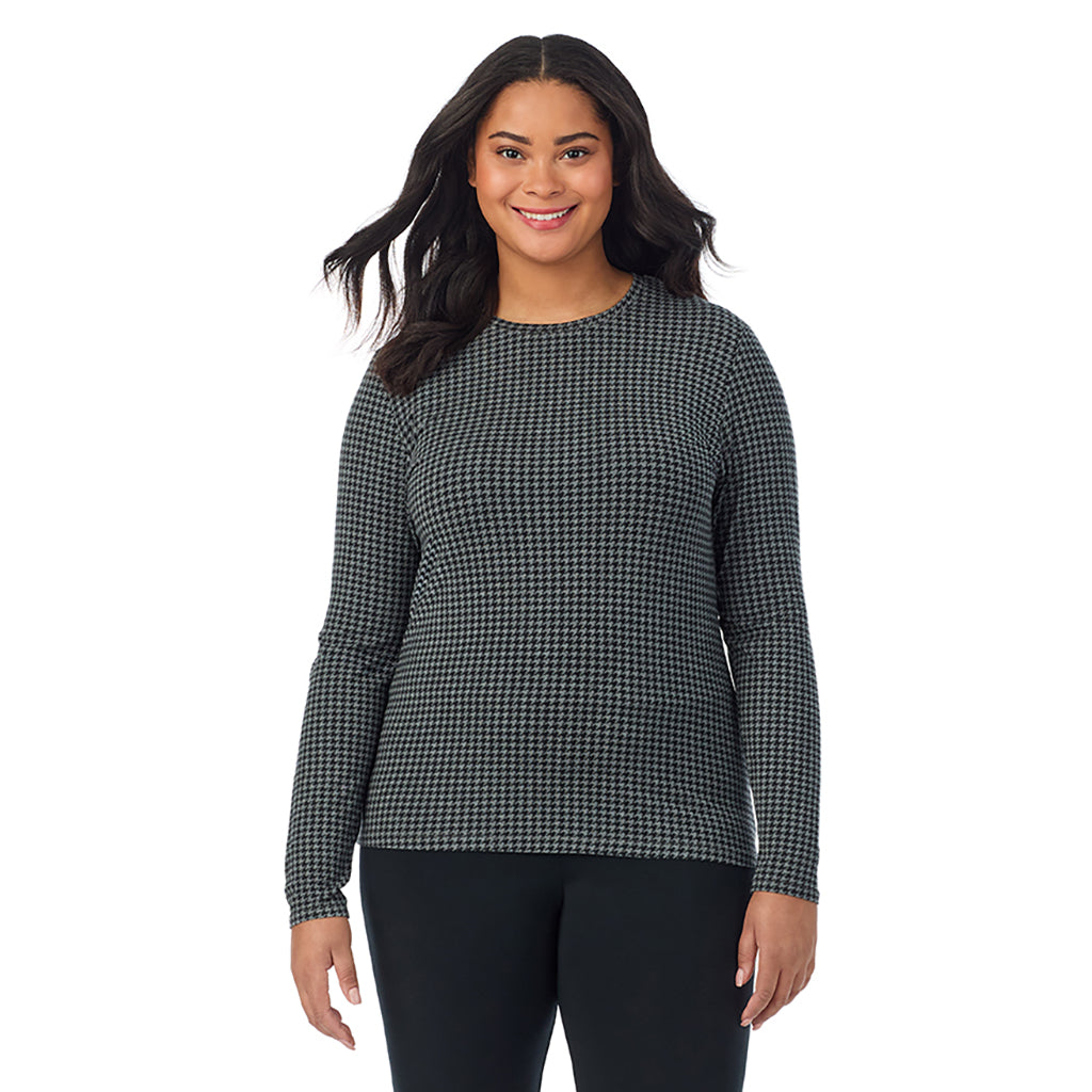 Charcoal Heather Houndstooth; Model is wearing size 1X. She is 5'11", Bust 36", Waist 36.5", Hips 47.5". @A lady wearing a charcoal heather houndstooth long sleeve crew plus.