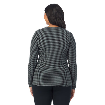 Charcoal Heather Houndstooth; Model is wearing size 1X. She is 5'11", Bust 36", Waist 36.5", Hips 47.5". @A lady wearing a charcoal heather houndstooth long sleeve crew plus.