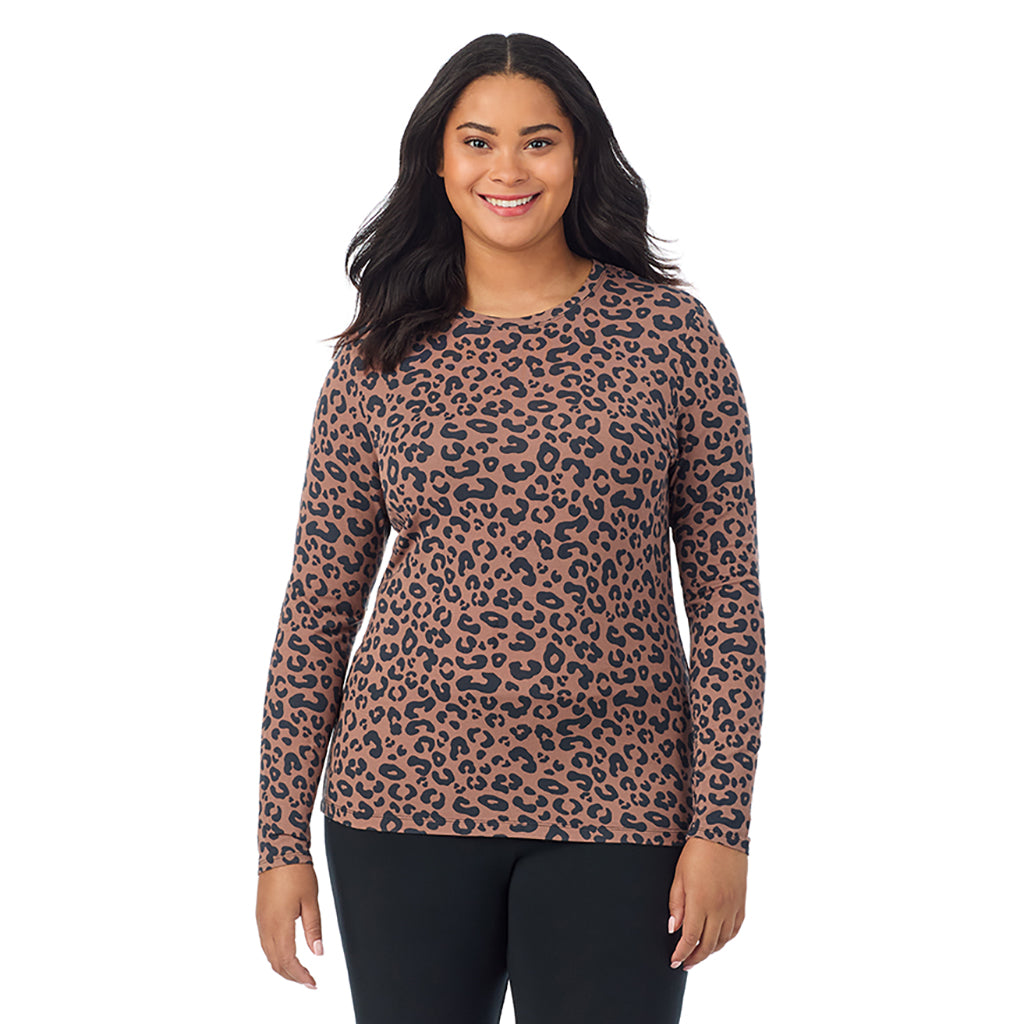 Pecan Animal; Model is wearing size 1X. She is 5'11", Bust 36", Waist 36.5", Hips 47.5". @A lady wearing a pecan animal long sleeve crew plus.