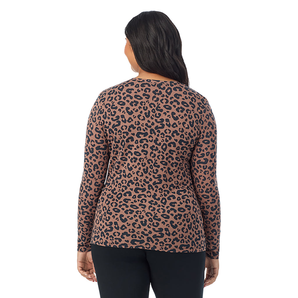 Pecan Animal; Model is wearing size 1X. She is 5'11", Bust 36", Waist 36.5", Hips 47.5". @A lady wearing a pecan animal long sleeve crew plus.