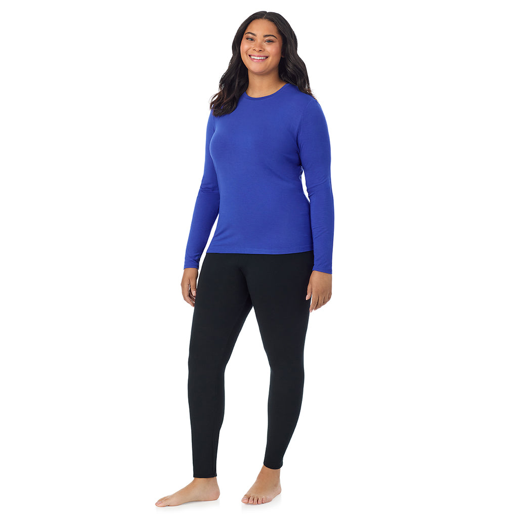 Dazzling Blue; Model is wearing size 1X. She is 5'11", Bust 36", Waist 36.5", Hips 47.5". @A lady wearing a dazzling blue long sleeve crew plus.