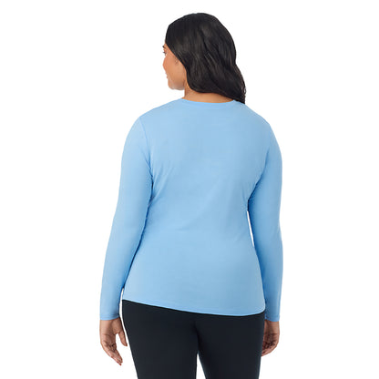 Vista Blue; Model is wearing size 1X. She is 5'11", Bust 36", Waist 36.5", Hips 47.5". @A lady wearing a vista blue long sleeve crew plus.