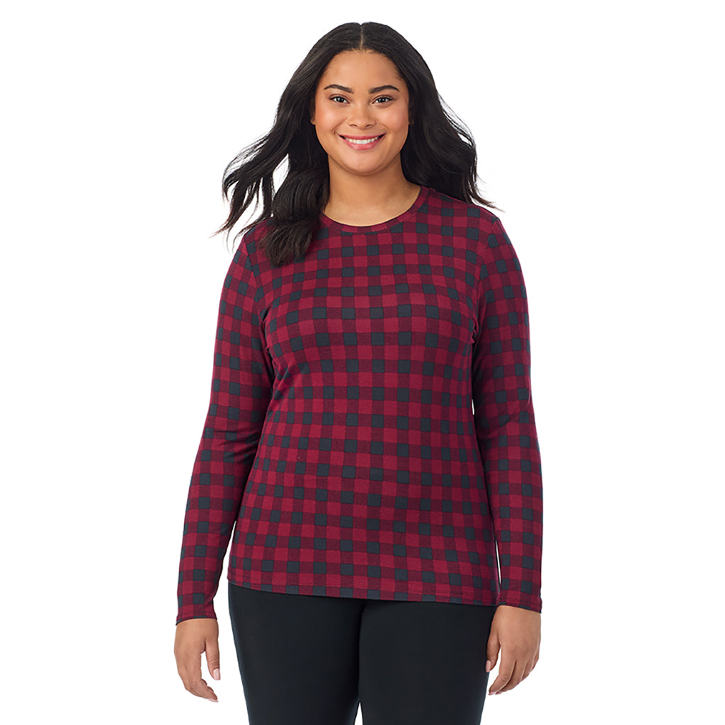 A lady wearing a cabernet buffalo check long sleeve crew plus.