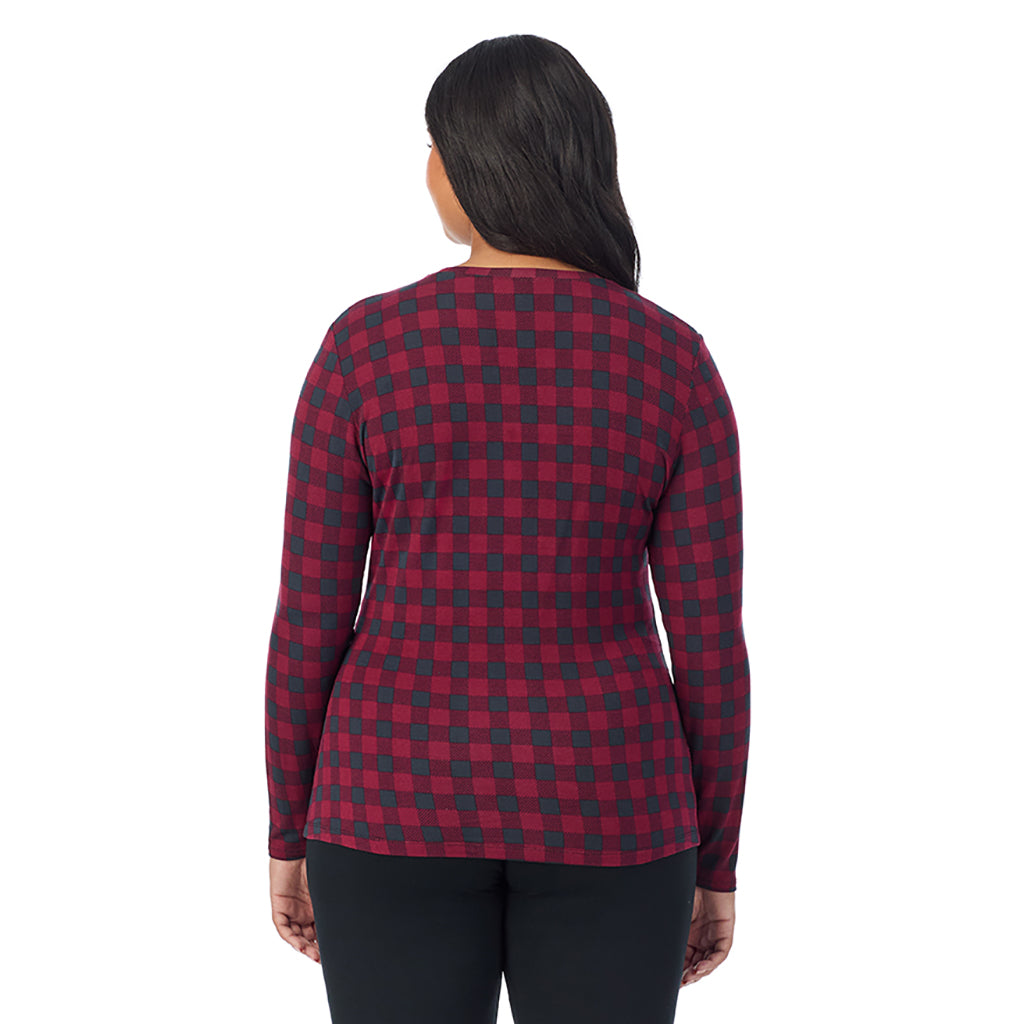 A lady wearing a cabernet buffalo check long sleeve crew plus.