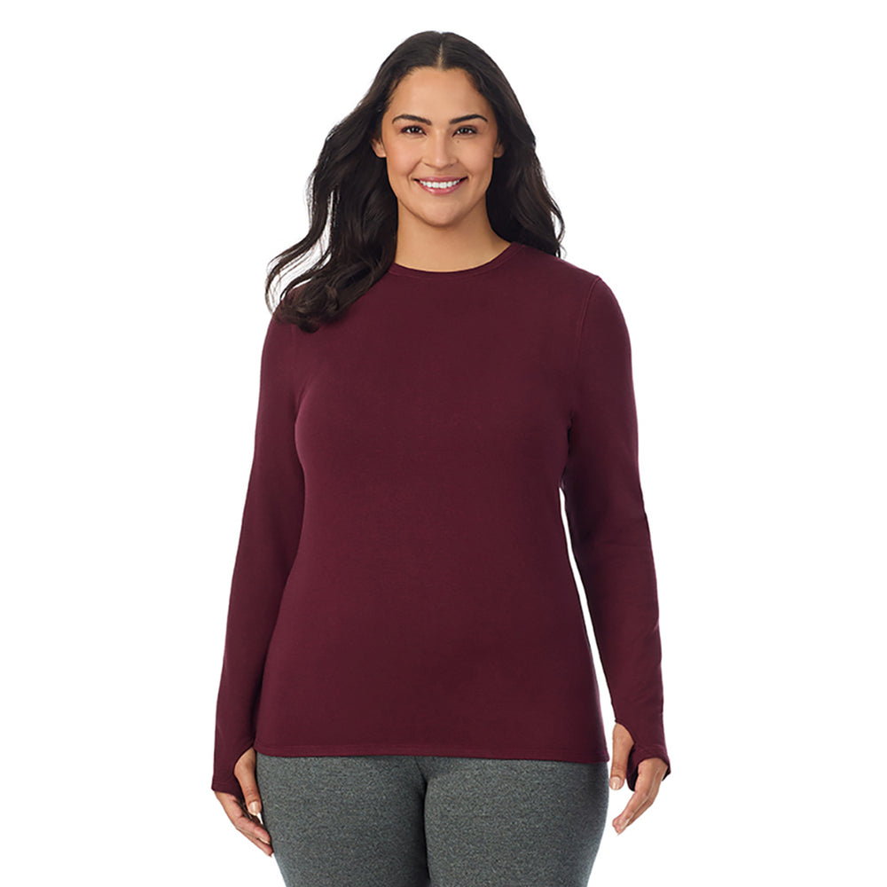 A lady wearing carbernet heather Ultra Cozy Long Sleeve Crew PLUS