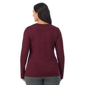  A lady wearing carbernet heather Ultra Cozy Long Sleeve Crew PLUS