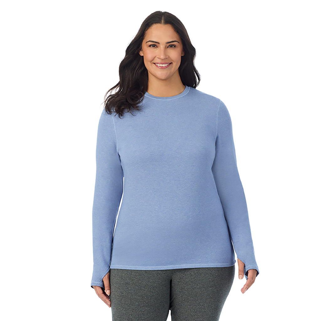  A lady wearing smoke blue heather Ultra Cozy Long Sleeve Crew PLUS