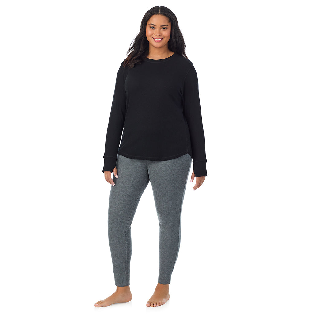 Black; Model is wearing size 1X. She is 5'11", Bust 36", Waist 36.5", Hips 47.5"@ A Lady is wearing Black Cozy Stretch Thermal Long Sleeve Crew PLUS