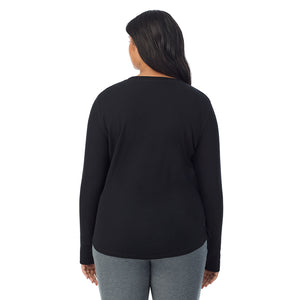 A lady wearing Cozy Stretch Thermal Long Sleeve Crew PLUS in Black side view side view