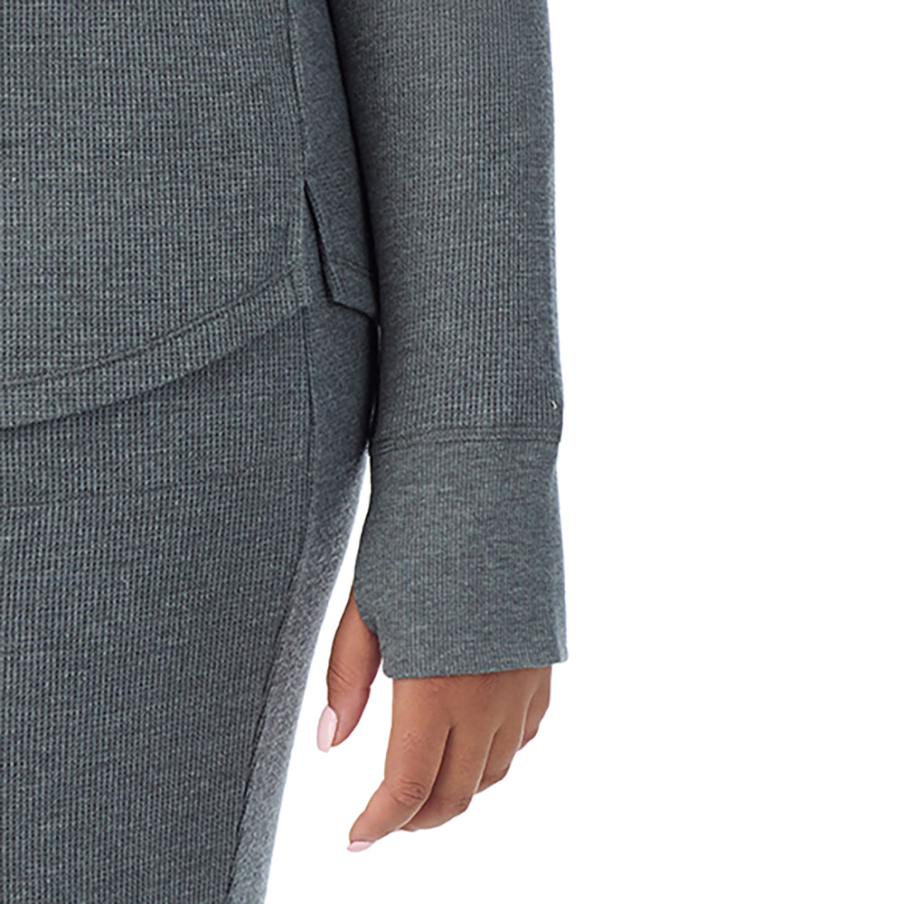 A lady wearing Cozy Stretch Thermal Long Sleeve Crew PLUS in Stone Grey Heather close up close up