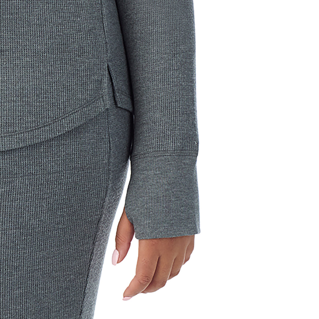 A lady wearing Cozy Stretch Thermal Long Sleeve Crew PLUS in Stone Grey Heather close up close up