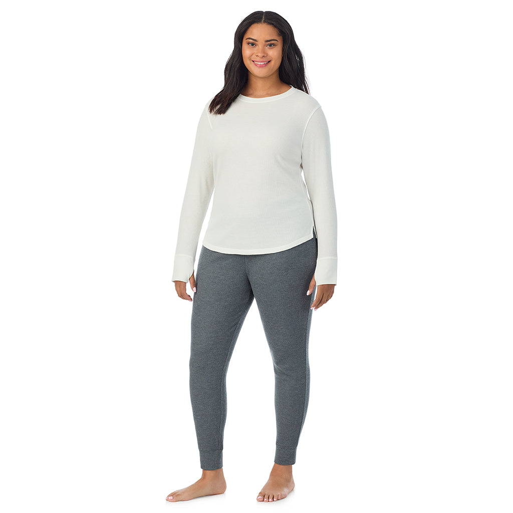 Ivory; Model is wearing size 1X. She is 5'11", Bust 36", Waist 36.5", Hips 47.5"@ A Lady is wearing Ivory Cozy Stretch Thermal Long Sleeve Crew PLUS