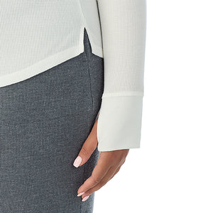 A lady wearing Cozy Stretch Thermal Long Sleeve Crew PLUS in Ivory close up close up