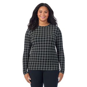 A lady wearing a charcoal/black plaid long sleeve crew plus.