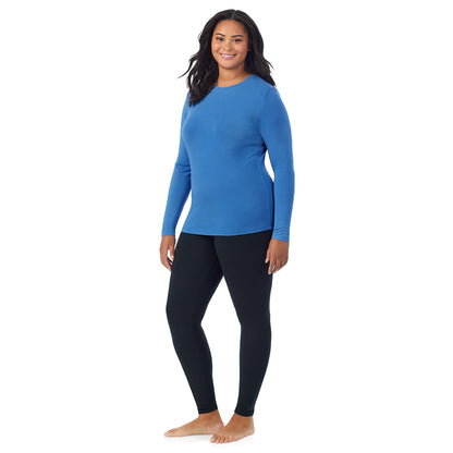 Blue Comet; Model is wearing size 1X. She is 5'11", Bust 36", Waist 36.5", Hips 47.5".@A lady wearing a blue comet long sleeve crew plus.