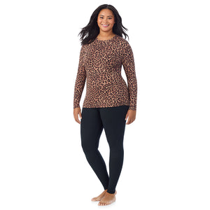 A lady wearing a taupe leopard long sleeve crew plus.