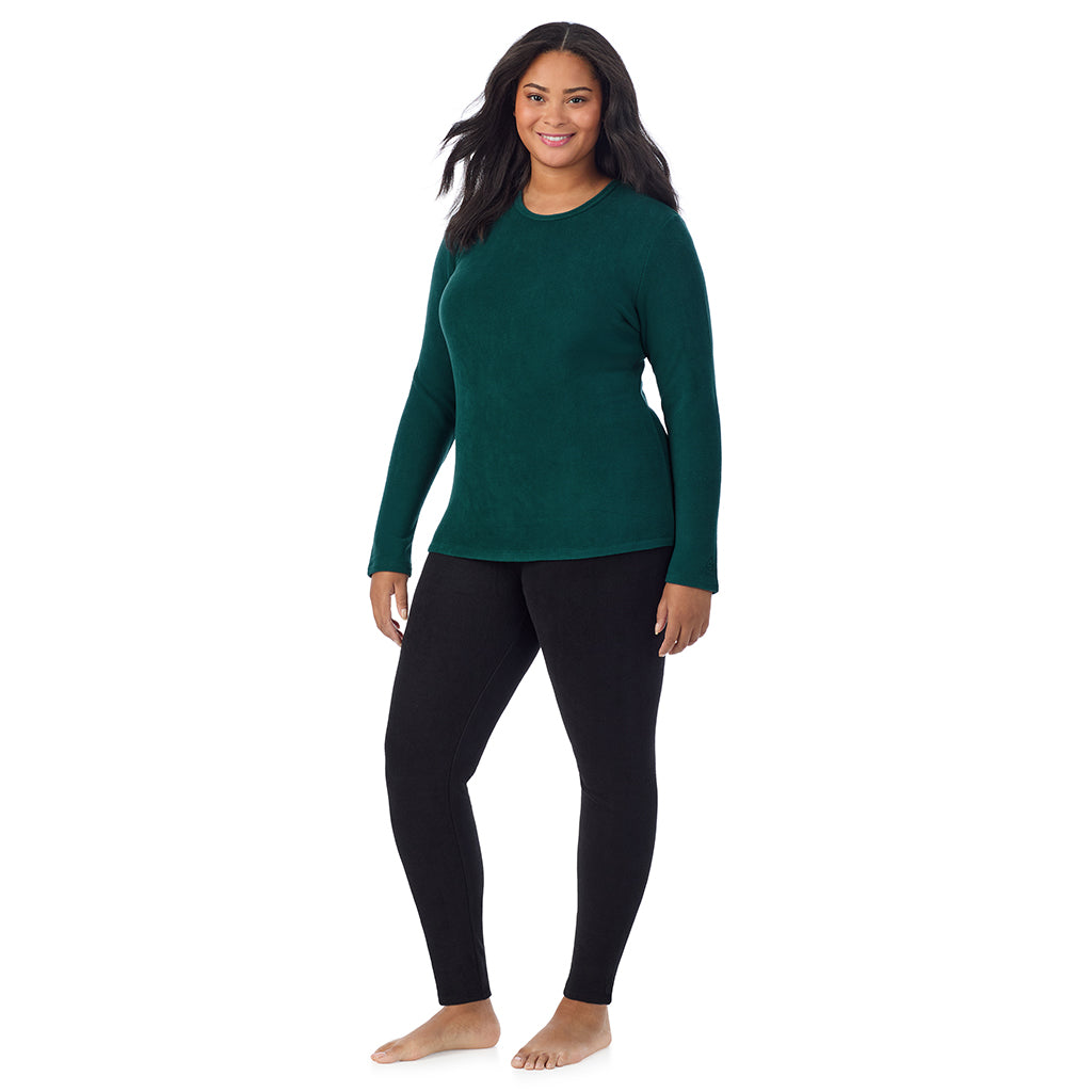 A lady wearing Dark Pine fleecewear with stretch long sleeve crew plus.
