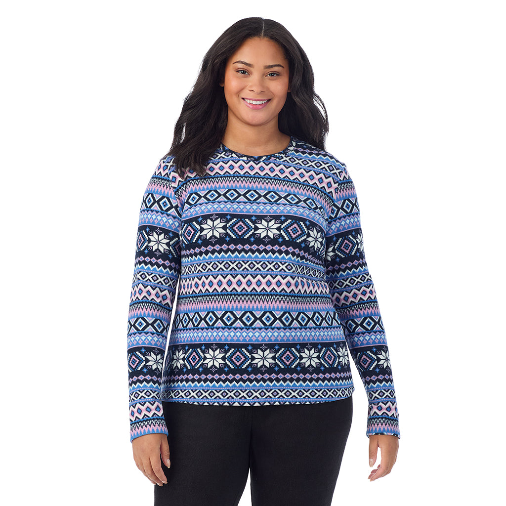 A lady wearing Blue Fairisle fleecewear with stretch long sleeve crew plus.