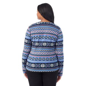 A lady wearing Blue Fairisle fleecewear with stretch long sleeve crew plus.