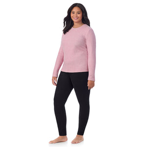 A lady wearing Mauve Mist Heather fleecewear with stretch long sleeve crew plus.