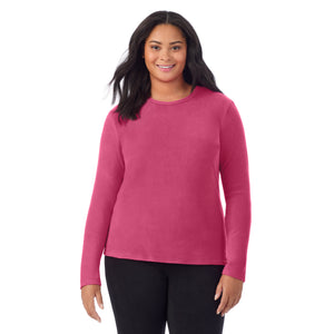 A lady wearing Very Berry fleecewear with stretch long sleeve crew plus.