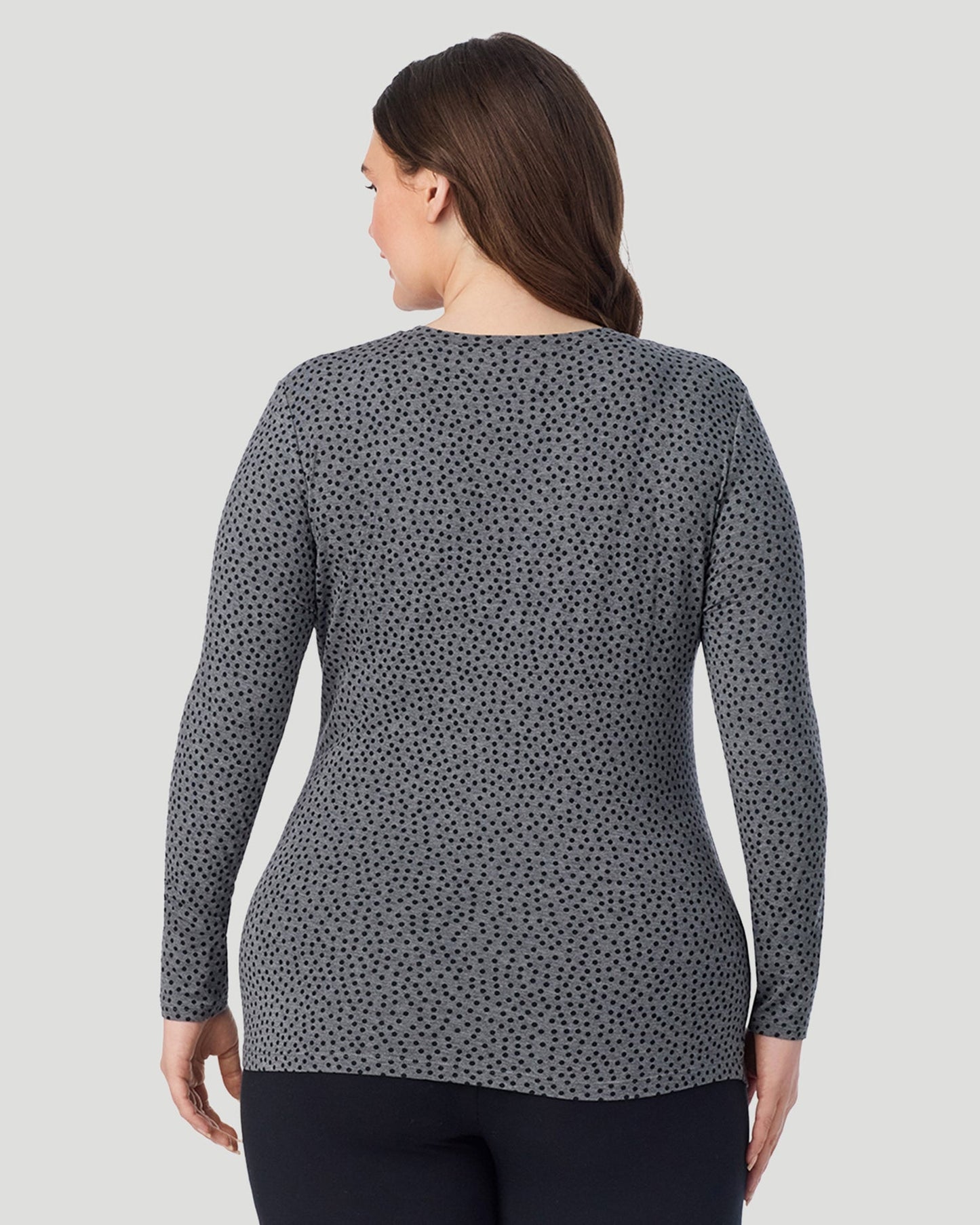 Charcoal Polka Dot ; Model is wearing size 1X. She is 5'10", Bust 44", Waist 36", Hips 49". @ A Plus size lady wearing Charcoal Polka Dot Softwear With Stretch Long Sleeve Crew PLUS in a back view pose