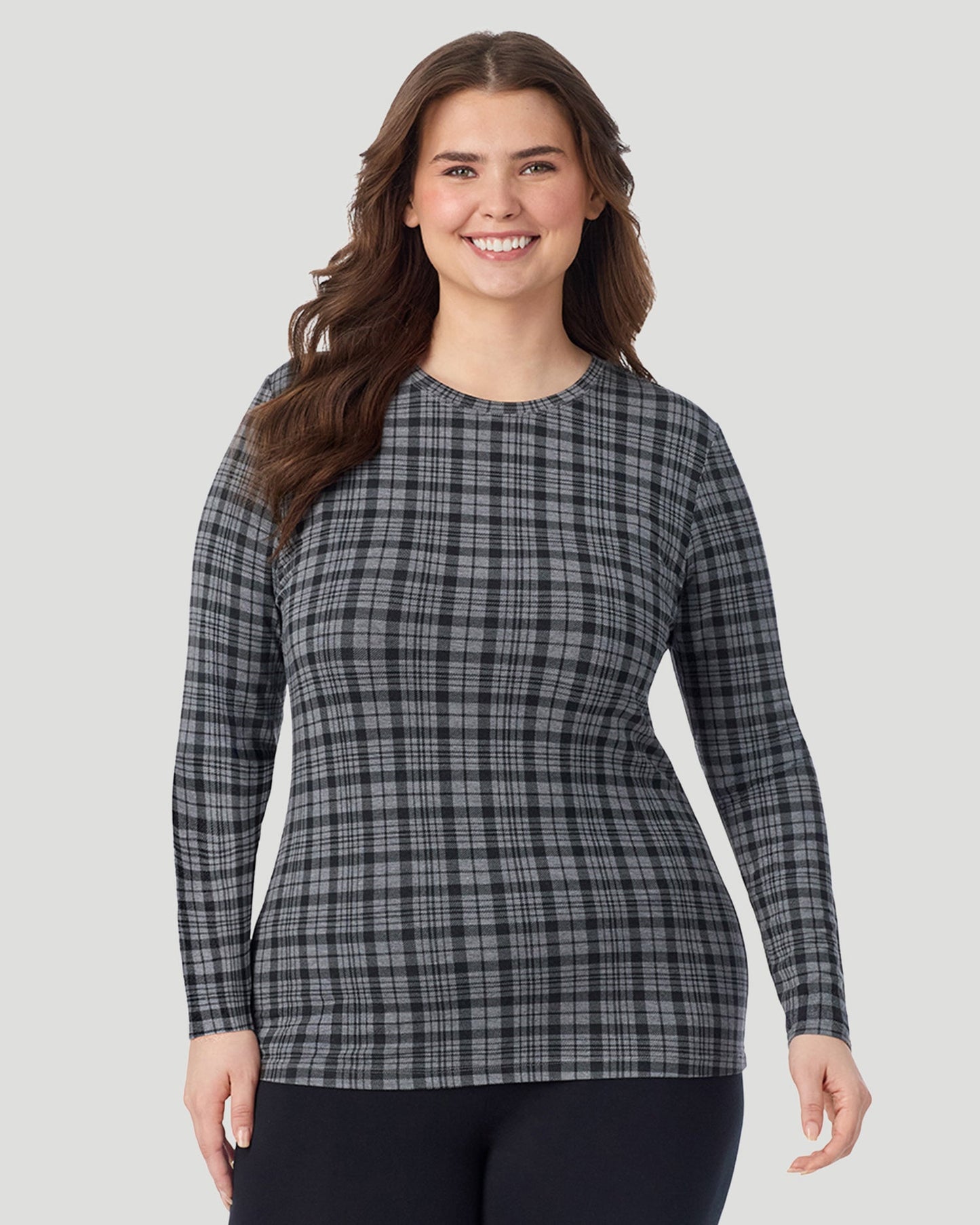 Charcoal Tartan; Model is wearing size 1X. She is 5'10", Bust 44", Waist 36", Hips 49". @ A Plus size lady wearing Charcoal Tartan Softwear With Stretch Long Sleeve Crew PLUS in a front view pose