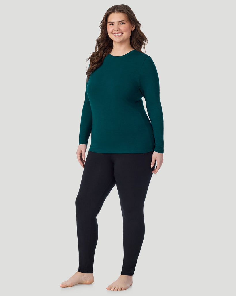  A Plus size lady wearing Deep Emerald Softwear With Stretch Long Sleeve Crew PLUS in a front view standing pose