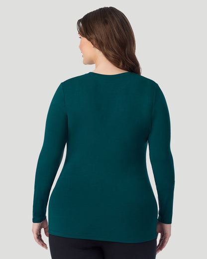  A Plus size lady wearing Deep Emerald Softwear With Stretch Long Sleeve Crew PLUS in a back view pose