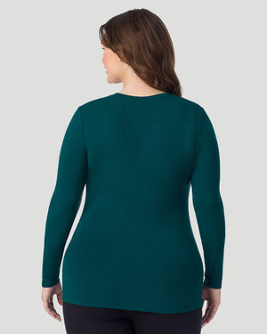  A Plus size lady wearing Deep Emerald Softwear With Stretch Long Sleeve Crew PLUS in a back view pose