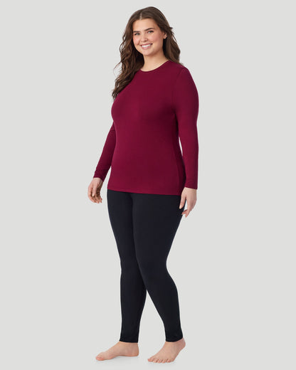  A Plus size lady wearing Scarlet Softwear With Stretch Long Sleeve Crew PLUS in a front view standing pose