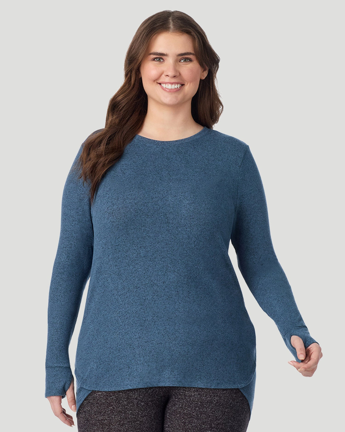 Deep Chambray; Model is wearing size 1X. She is 5'10", Bust 44", Waist 36", Hips 49". @ A Lady is wearing Deep Chambray SoftKnit Long Sleeve Crew PLUS in a front look closer view