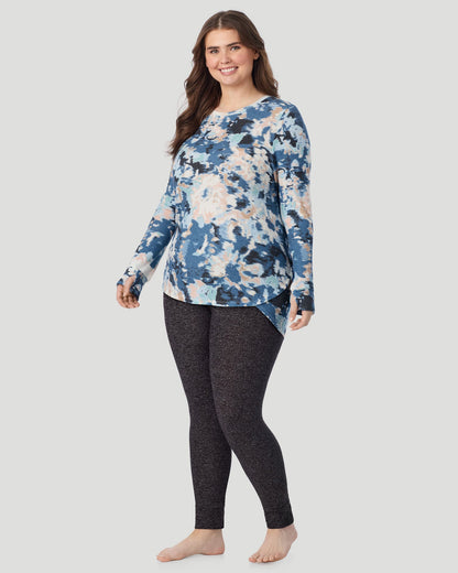  A Lady is wearing Blue Floral SoftKnit Long Sleeve Crew PLUS in a front look standing view