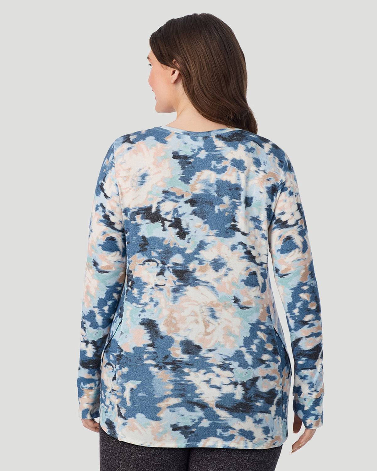  A Lady is wearing Blue Floral SoftKnit Long Sleeve Crew PLUS in a back look closer view