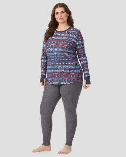 A lady wearing Cozy Stretch Thermal Long Sleeve Crew PLUS in Medieval Blue Fairisle 