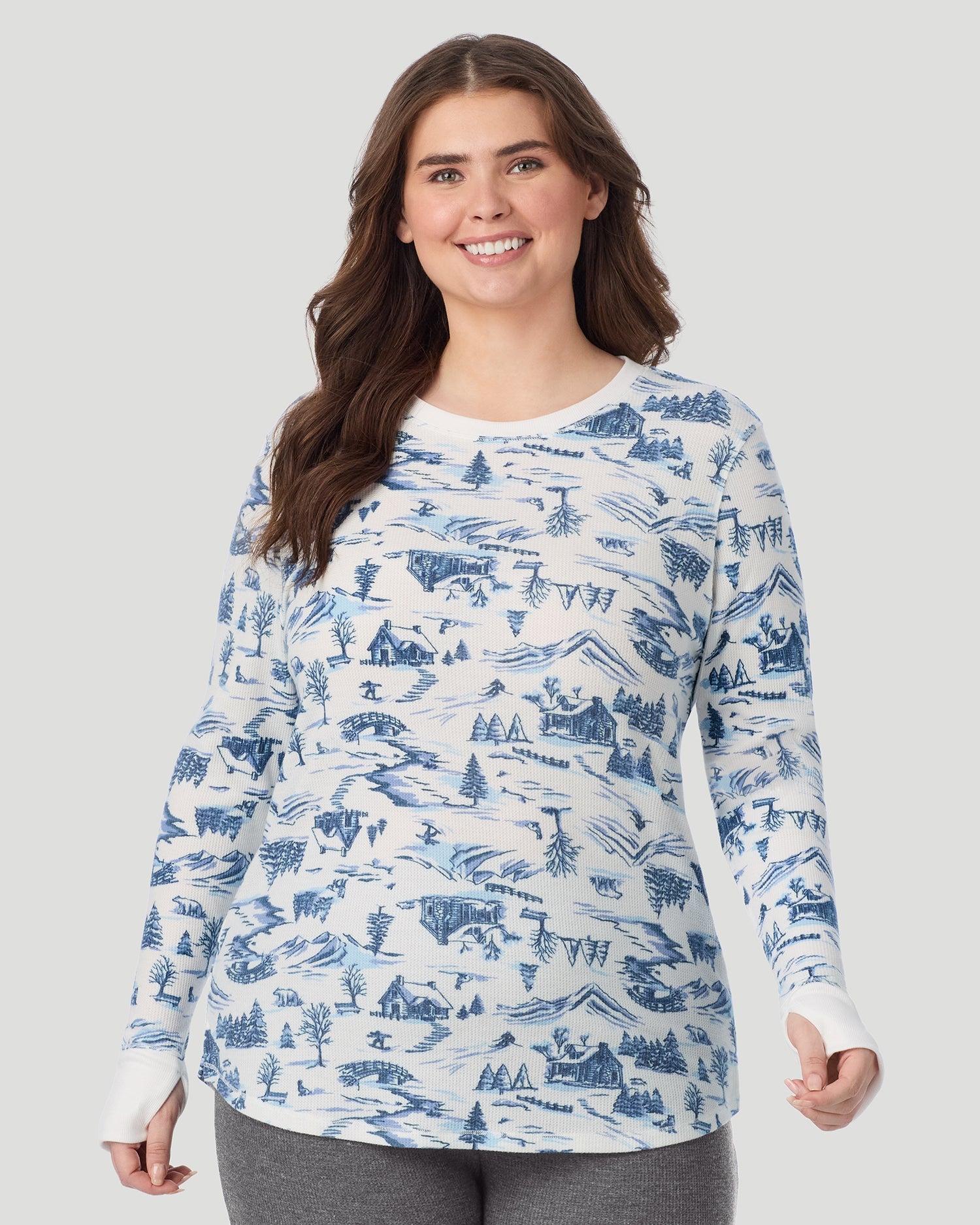 A lady wearing Cozy Stretch Thermal Long Sleeve Crew PLUS in Blue Winter Toile