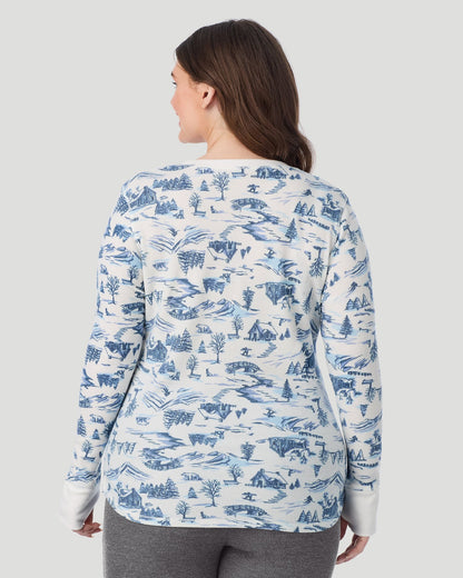 A lady wearing Cozy Stretch Thermal Long Sleeve Crew PLUS in Blue Winter Toile