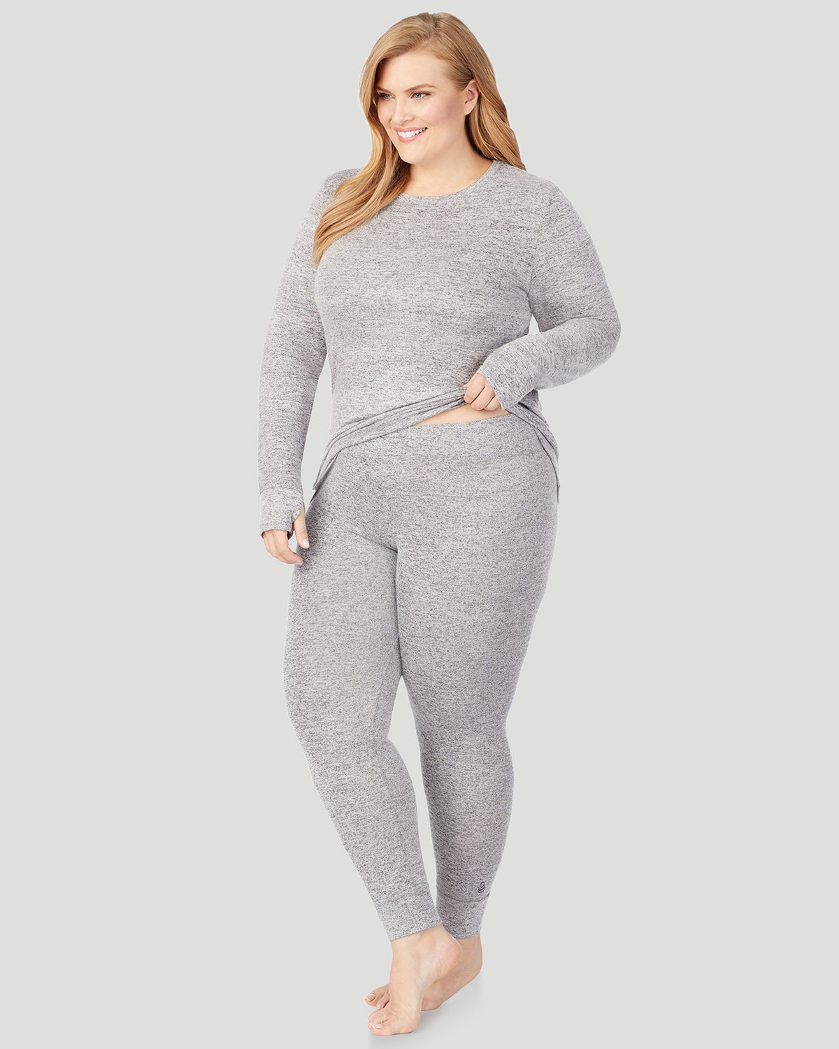 A lady wearing SoftKnit Legging PLUS in Marled Grey back view back view