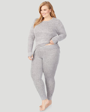 A lady wearing SoftKnit Legging PLUS in Marled Grey back view back view
