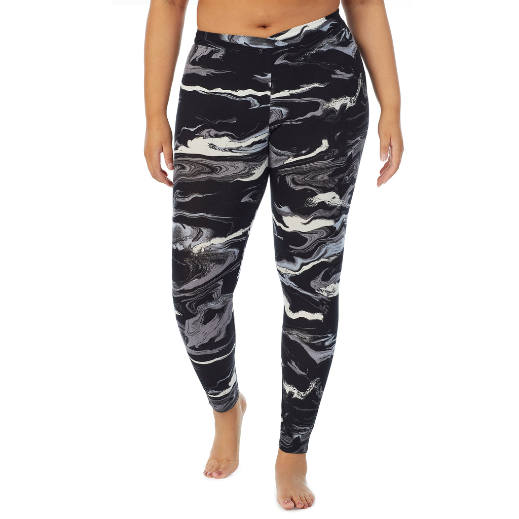 A lady wearing a Black & White Marble stretch legging plus.