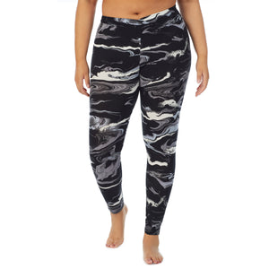 A lady wearing a Black & White Marble stretch legging plus.