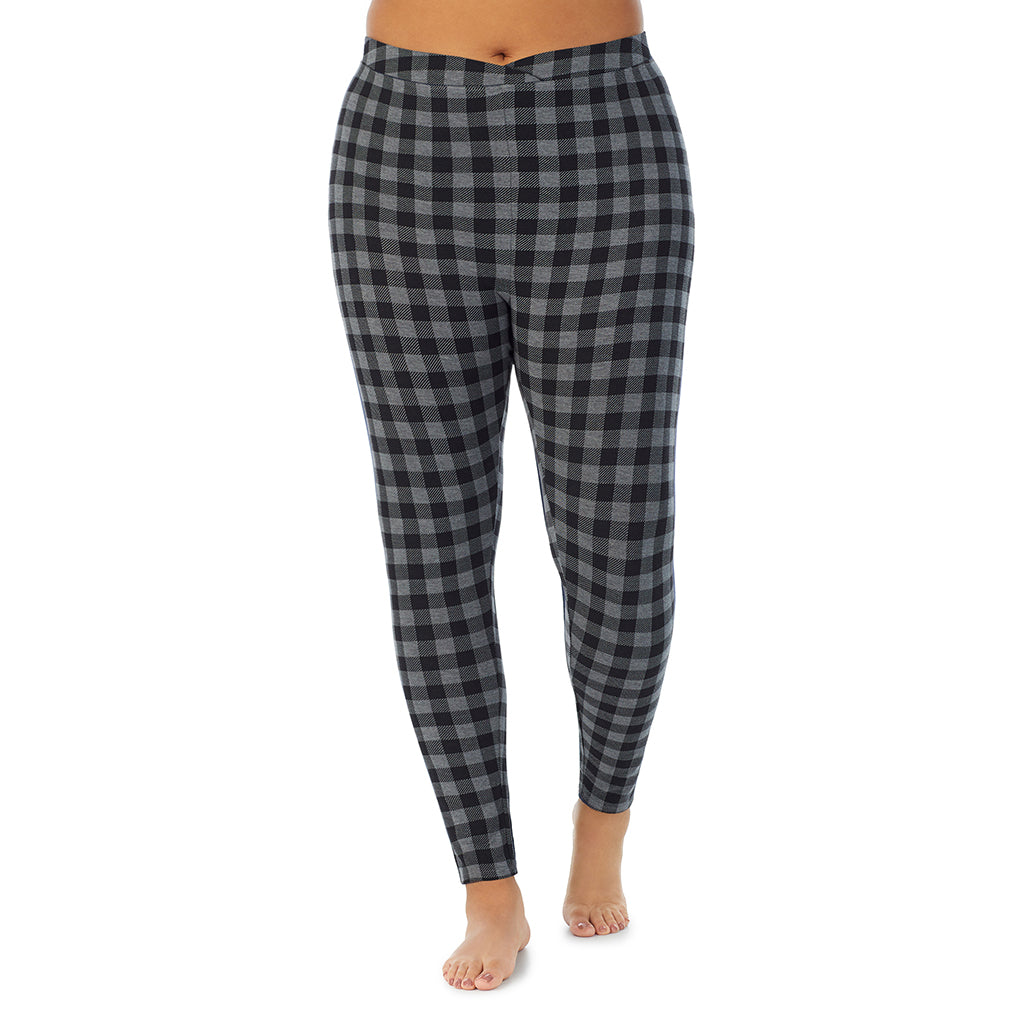 A lady wearing a grey tonal buffalo stretch legging plus.