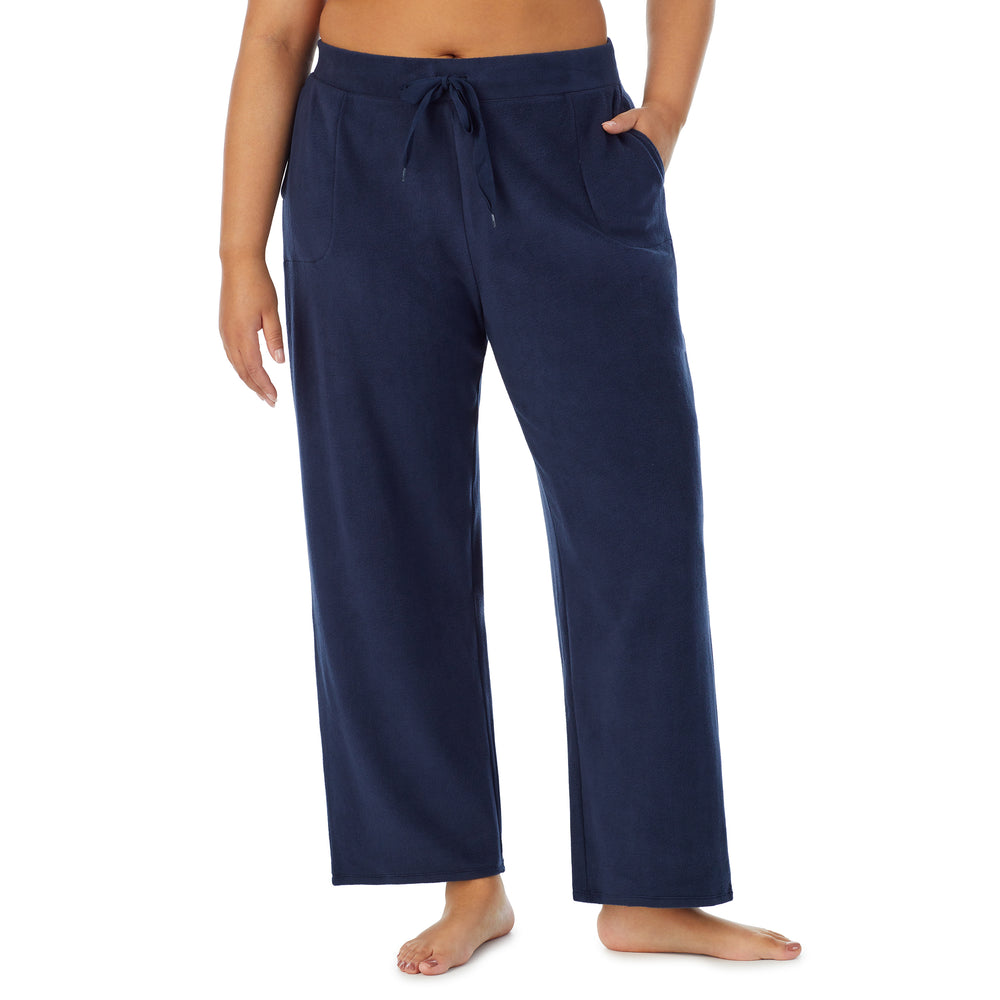 A lady wearing Fleecewear With Stretch Lounge Pant PLUS in Navy Blazer back view back view