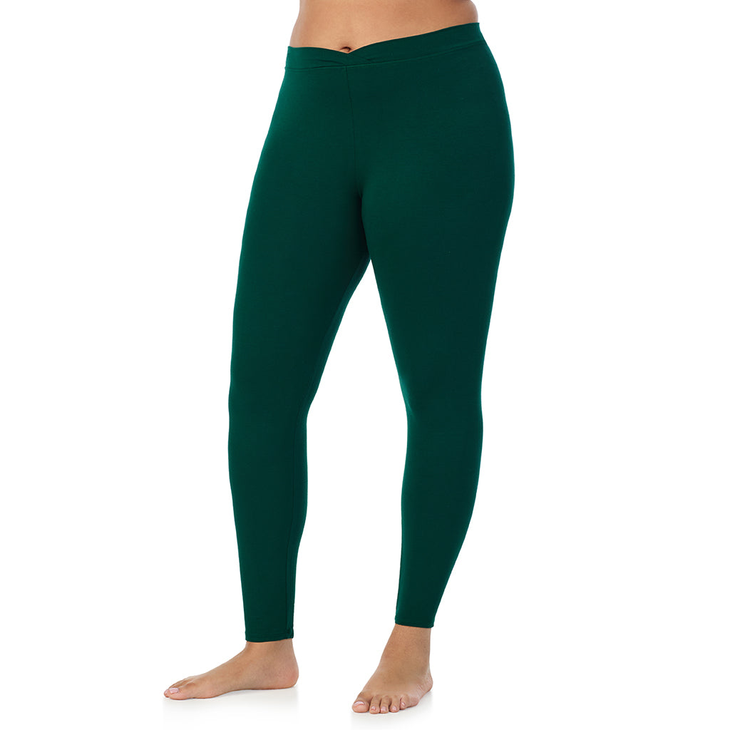 Evergreen;Model is wearing size 1X. She is 5'11", Bust 36", Waist 36.5", Hips 47.5". @A lady wearing a evergreen stretch legging plus.